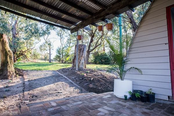 The paved area of Julia Nance Studio