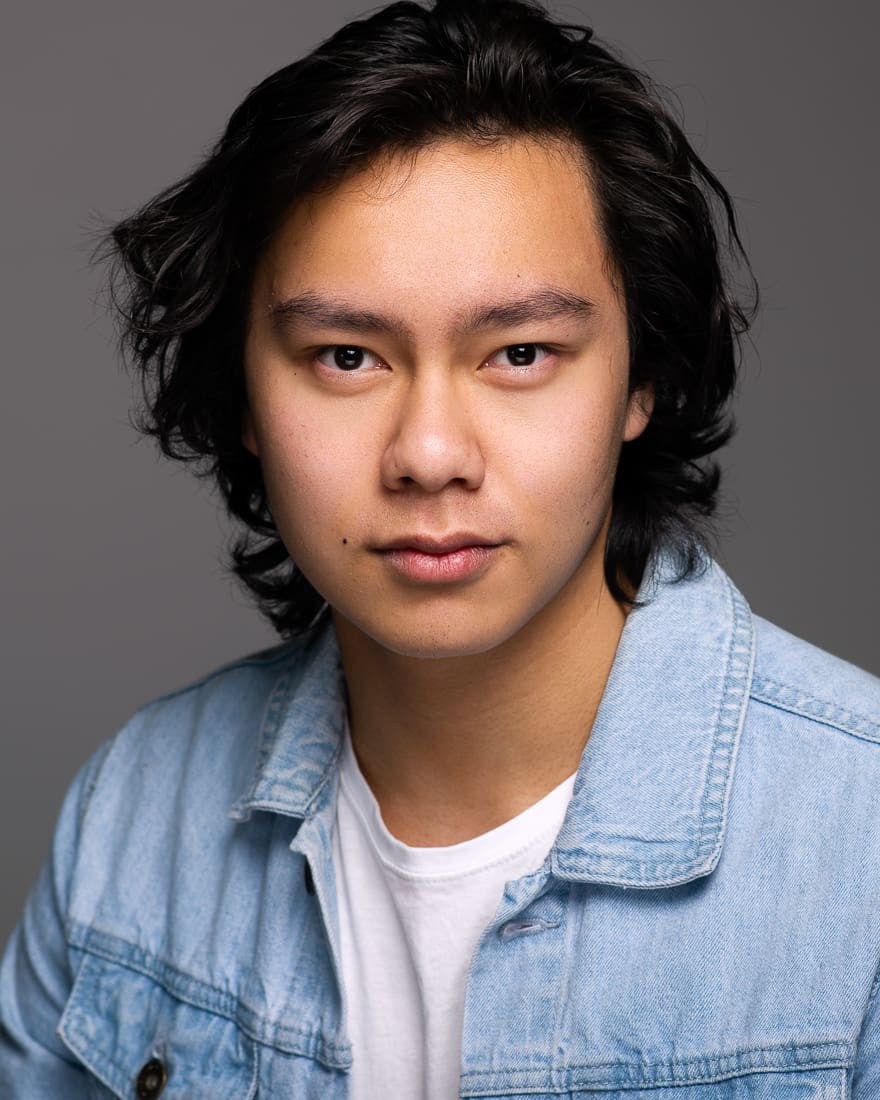 Melbourne actor headshot of guy in studio setting with a serious expression