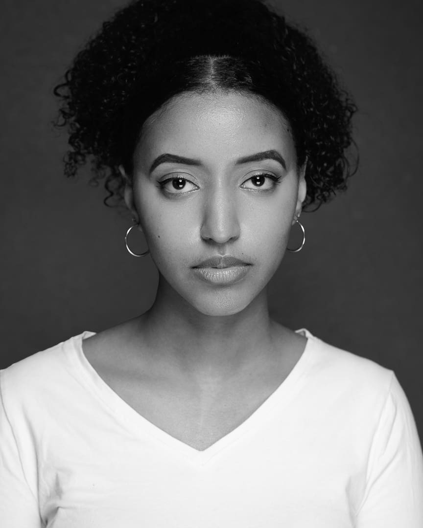 Melbourne actress looks to camera with serious and relaxed expression for acting headshot update.